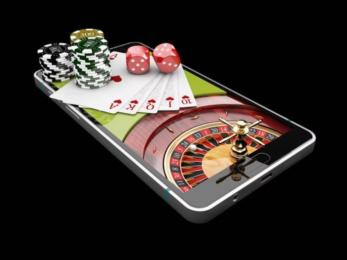 Sports bettor reviewing basketball match odds on pesowin for a winning wager